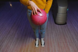 girl standing with a bowl