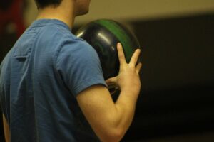 man playing bowl