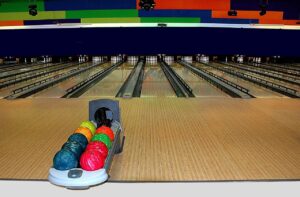 bowling lane with balls