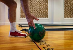 player with a bowling ball