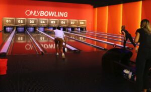 players playing bowling