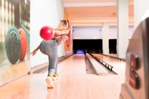 women in bowling alley