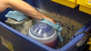 Polishing bowling ball